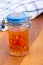 Hot pepper jelly preserving on table