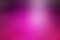 Hot pink and ultraviolet purple colors blurred in an out of focus background design