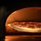 Hot pizza on wood freshly baked. Ready to eat pepperoni pizza with salami against blurred background of furnace with