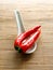 Hot red chilis in ceramic spoon