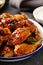 Hot sauce glazed chicken wings, roasted or fried