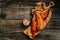 Hot smoked river bass fish on wooden cutting board. banner, menu, recipe place for text, top view
