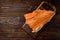 Hot smoked salmon trim and leftovers with bones and fins on dark wooden background