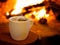 Hot smoking coffee by fireplace