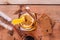 Hot spiced tea in jar on wooden table