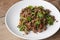 Hot and spicy minced beef with chili and basil.
