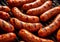 Hot and spicy pork sausages on grill.Macro.AI Generative