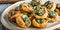 Hot Spinach Puffs on a baking tray