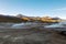 Hot spring at El Tatio Geysers with steaming geysers, hot springs, boiling water all around at sunrise, Chile, South America