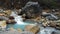 Hot spring river at kawah ratu crater