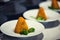Hot Starter Food - Deep Fried Camembert with Mango Sauce. Gourmet Restaurant Appetizers Menu