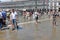 Hot summer afternoon and flooding on St. mark`s square in Venice Italy