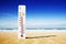 Hot summer day. Celsius scale thermometer in the sand. Ambient temperature plus 36