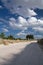 Hot summer day in turkish sandstone desert walking with blue sky and clouds