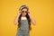 Hot and sunny. cheerful little girl yellow wall. retro child long hair. small kid vintage sunglasses. Vacation mode on