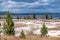 Hot thermal spring Abyss Pool in Yellowstone National Park, West Thumb Geyser Basin area, Wyoming, USA