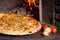 Hot Tuna pizza with oven fire