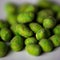 Hot Wasabi Peanuts. Wasabi coated peanuts close-up. Green spicy Japanese snack