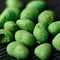 Hot Wasabi Peanuts. Wasabi coated peanuts close-up. Green spicy Japanese snack