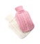 Hot water bottles with knitted covers isolated on white, top view