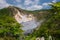 The hot water of Oyunuma pond in the volcanic landscape of Hell Valley Jigokudani