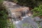 Hot water of the Oyunumagawa river flowing from the Oyunuma pond through Hell Valley Jigokudani