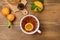 Hot Winter Berry Tea with Cranberries and Citrus Wooden Background Ripe Fruit Citrus Oranges Top View