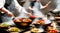 A hot wok with chef in a Chinese kitchen. back view of the chef, Chinese food being cooked in a wok on fire in the Chinese kitchen