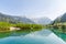 Hotaka mountain range and taisho ike pond in spring at kamikochi nagano japan