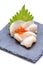 Hotate Scallop Sashimi Served with Ikura Salmon Roe and Sliced Radish on The Black Stone Plate