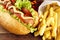 Hotdogs ready-to-eat with fresh salad on wooden desk