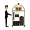 Hotel bellboy carrying the luggage.Vector