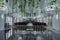 Hotel conference hall with empty chairs, green design with green plants and flowers