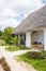 Hotel cottage in tropical resort. Rural cabin in tropics. Tourist bungalow in exotic garden. Summer vacations in Africa.