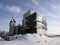 Hotel on the frozen lake shore