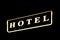 Hotel glowing sign at night