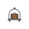 Hotel luggage cart with suitcase filled outline icon