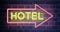 Hotel neon sign above guest house room - 4k