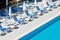 Hotel Poolside Chairs near a swimming pool