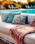 Hotel poolside lounge are with sofa with oriental arabic or turkish ornaments pillows and plaid. Beautiful eastern spa or wellness