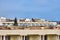 Hotel roofs and unfinished houses in an Arab city in the middle East. The upper floors of uncompleted buildings in Tunisia near