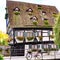 Hotel Schiefes Haus - leaning hotel, Romantic Street, Baden-Wuerttemberg, Germany. Half-timber house in historic district of Ulm.