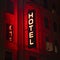 Hotel sign in neon light at night