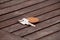 Hotel suite key with wooden fob for room on wood table. Room key on wood texture and background.