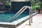 Hotel Swimming pool with metal handrail stair