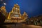 Hotel Ukraine Radisson Collection illuminated facade at night