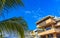 Hotels resorts buildings in paradise among palm trees Puerto Escondido