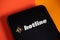 Hotline app logo seen on the smartphone. Hotline platform is a new drop in audio chat developed by Facebook, competitor to popular