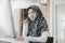 Hotline. happy muslim woman female call center customer support executive with headset working in office, education online, custom