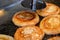 hotteok, Korean Syrup-filled Pancake : Fermented flour dough shaped into balls, filled with a spoonful of brown sugar, and pan-